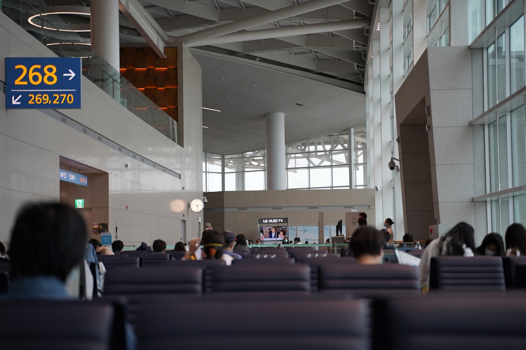 Travelers inside Incheon International Airport terminal in South Korea