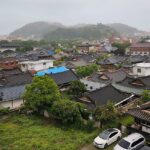 Curved tiled rooftops of traditional hanok houses in Jeonju Hanok Village